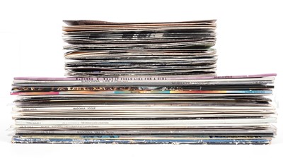 Lot 557 - A large collectors' bundle of Madonna LPs, 12" singles and 7" singles