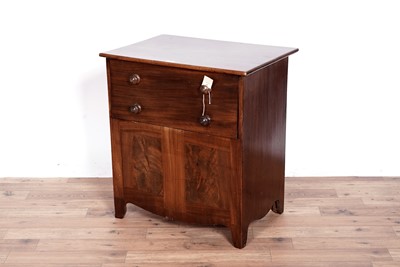 Lot 34 - A George III oak commode