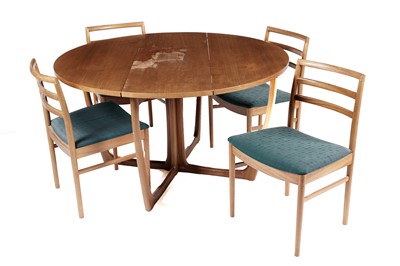 Lot 807 - A mid-20th Century Beithcraft Ltd drop leaf dining table; and chairs