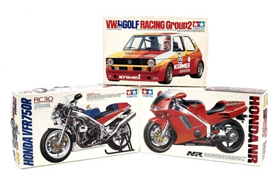 Lot 105 - Two Tamiya Honda motorcycle kits; and another