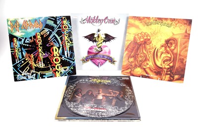 Lot 597 - A collectors' bundle of mixed heavy metal LPs, picture disks and 12" singles