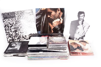 Lot 603 - A large collectors' bundle of George Michael LPs, 12" singles and 7" singles