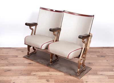 Lot 4 - A pair of early/mid-20th Century oak and cast metal cinema seats