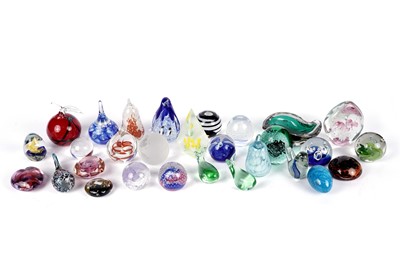 Lot 222 - A collection of decorative glass paperweights