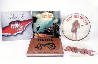 Lot 420 - AC/DC LPs, 12" singles and shaped singles