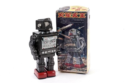 Lot 22 - A vintage Japanese battery-operated tinplate spaceman robot