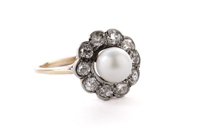 Lot 159 - A cultured pearl and diamond flower cluster ring