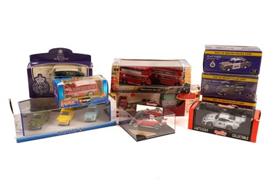 Lot 264 - A collection of boxed diecast vehicles