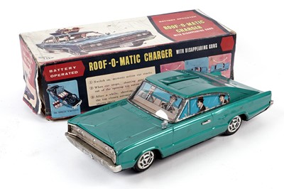 Lot 26 - A vintage tinplate Roof-O-Matic Charger toy car