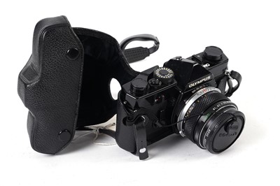 Lot 347 - An Olympus OM-1 SLR camera in black