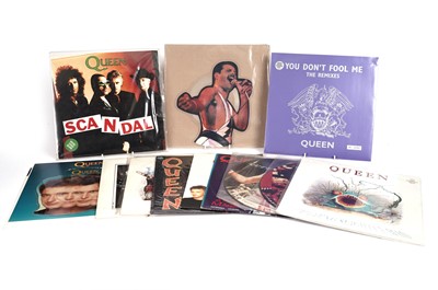 Lot 447 - A Queen collectors' bundle of 12" singles, picture discs and shaped singles