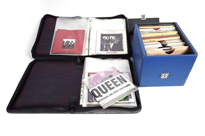 Lot 450 - A Queen collectors' bundle of 7" singles; and two folders of picture sleeves