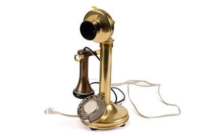 Lot 432 - A brass stick telephone