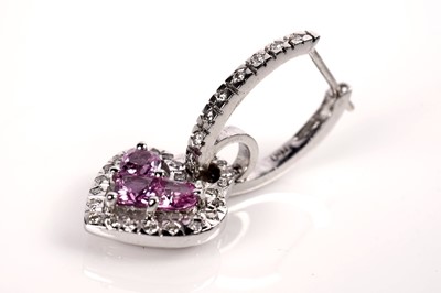 Lot 1259 - A pink sapphire and diamond ring and matching earrings