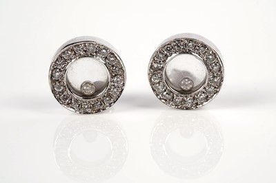 Lot 1260 - A Chopard Happy Diamonds style ring and earrings