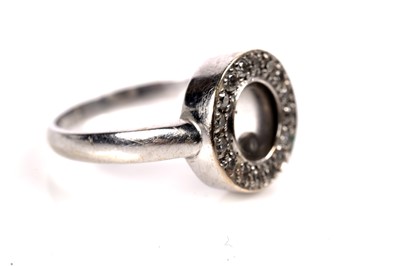 Lot 1260 - A Chopard Happy Diamonds style ring and earrings