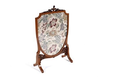 Lot 718 - A Victorian satinwood shield form fire screen