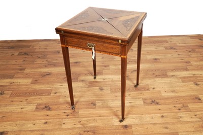 Lot 17 - An Edwardian mahogany and satinwood banded inlaid envelope card table