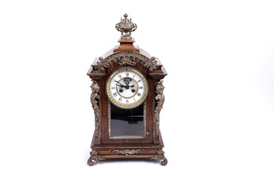 Lot 676 - A late 19th Century Continental ormolu mounted mahogany mantle clock