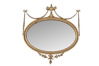 Lot 713 - A late 19th Century Adam style giltwood oval wall mirror