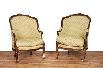 Lot 41 - A pair of early 20th Century French walnut framed tub chairs