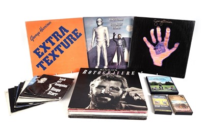 Lot 467 - A collectors' bundle of George Harrison and Ringo Starr LPs, singles, CDs, and cassettes