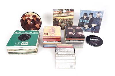 Lot 483 - A collectors' bundle of The Beatles 7" singles, CDs, and cassettes