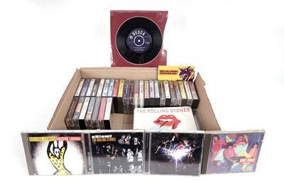 Lot 496 - A collectors' bundle of Rolling Stones 7" singles, CDs, and cassettes