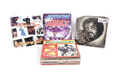 Lot 664 - A collectors' bundle of mixed Reggae LPs and 12" singles