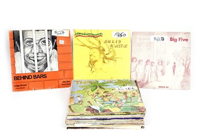 Lot 665 - A collectors' bundle of mixed Reggae LPs and 12" singles