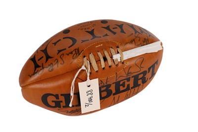 Lot 878 - A 1990s autographed Gilbert rugby ball