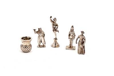 Lot 1745 - Three silver miniature figures and a thistle head pot; and a George V silver figure seal