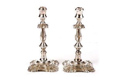 Lot 1358 - An Elizabeth II silver matched pair of cast tapersticks