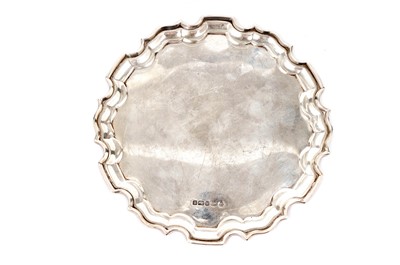 Lot 862 - An Elizabeth II silver Chippendale waiter