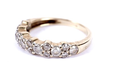 Lot 217 - A diamond half hoop eternity ring