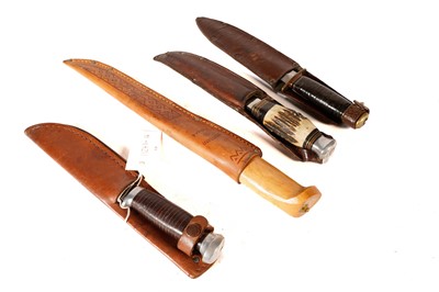 Lot 1004 - Four hunting knives