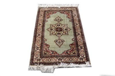 Lot 107 - A Tabriz rug