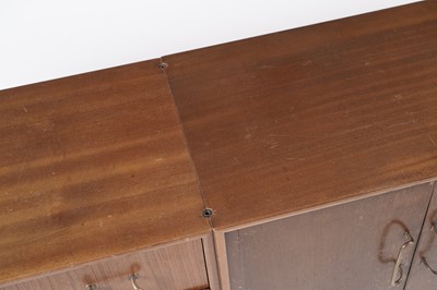 Lot 759 - A mid-20th Century modular teak wall unit by Peter Hayward for Vanson
