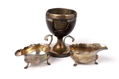 Lot 1633 - A selection of silver: including a George III mounted coconut goblet