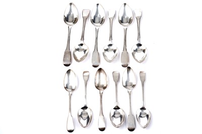 Lot 1635 - A set of six George III silver tablespoons; and six various silver dessert spoons