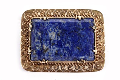 Lot 392 - A lapis lazuli brooch