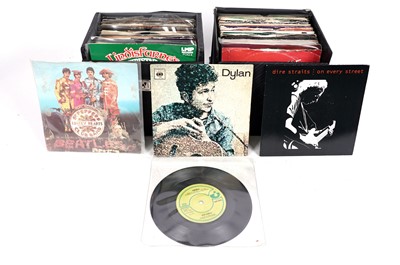 Lot 523 - A collectors' bundle of mixed 7" singles