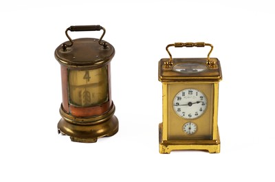 Lot 356 - A continental brass-cased carriage clock; and a brass and copper-cased ‘Flip’ clock