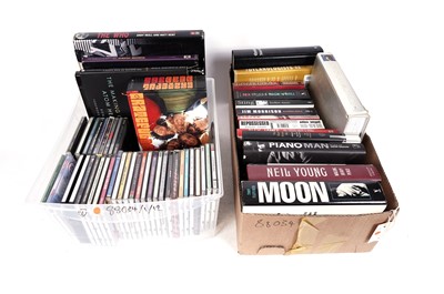 Lot 383 - A collectors' bundle of music related books; and a small collection of mixed CDs