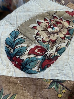 Lot 799 - A pair of Victorian patchwork quilts made by twin sisters Jane Ann and Mary Elizabeth