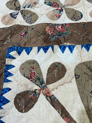 Lot 799 - A pair of Victorian patchwork quilts made by twin sisters Jane Ann and Mary Elizabeth