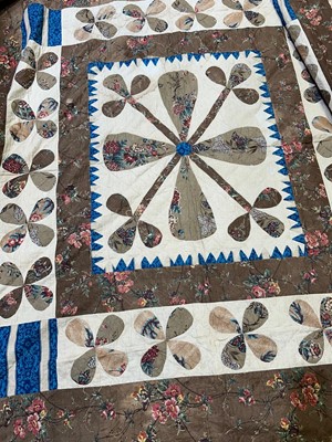 Lot 799 - A pair of Victorian patchwork quilts made by twin sisters Jane Ann and Mary Elizabeth