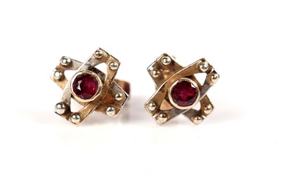 Lot 1087 - A ruby pendant and earrings
