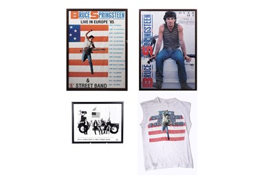 Lot 395 - A collectors' bundle of Brice Springsteen related framed posters and a vest