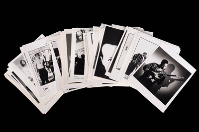 Lot 1349 - Record label promotional black and white photographs of bands and musicians